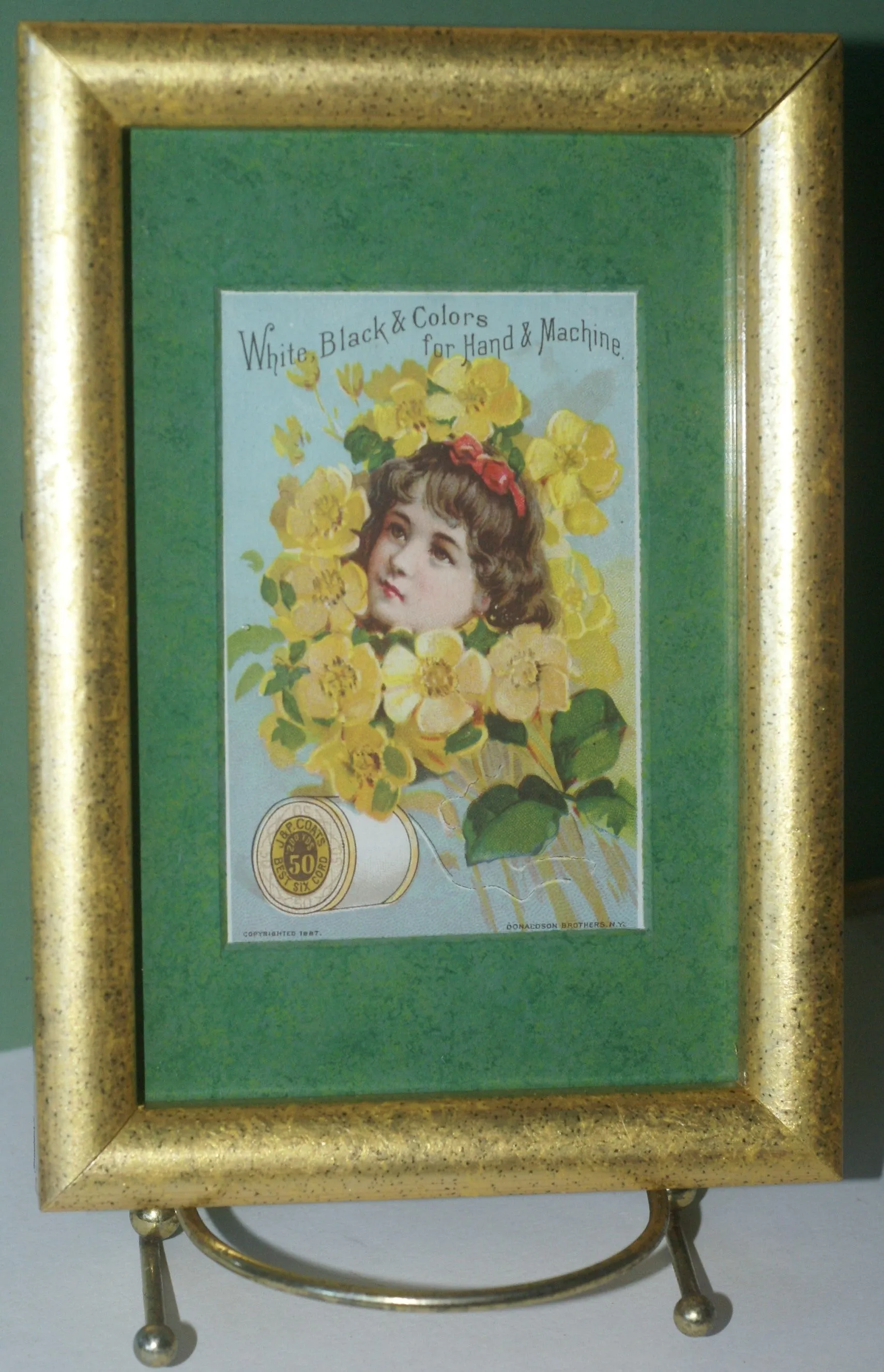 EPHEMERA AMERICANA WHIMSICAL ART: 1887 MATTED FRAMED WITH STAND, ANTIQUE AD VICTORIAN ADVERTISING TRADE CARD: J.& P. Coats GIRL YELLOW BOUQUET (DFPO1X) DESIGNER COLLECTOR COLLECTIBLE DELIGHTFUL WALL DÉCOR