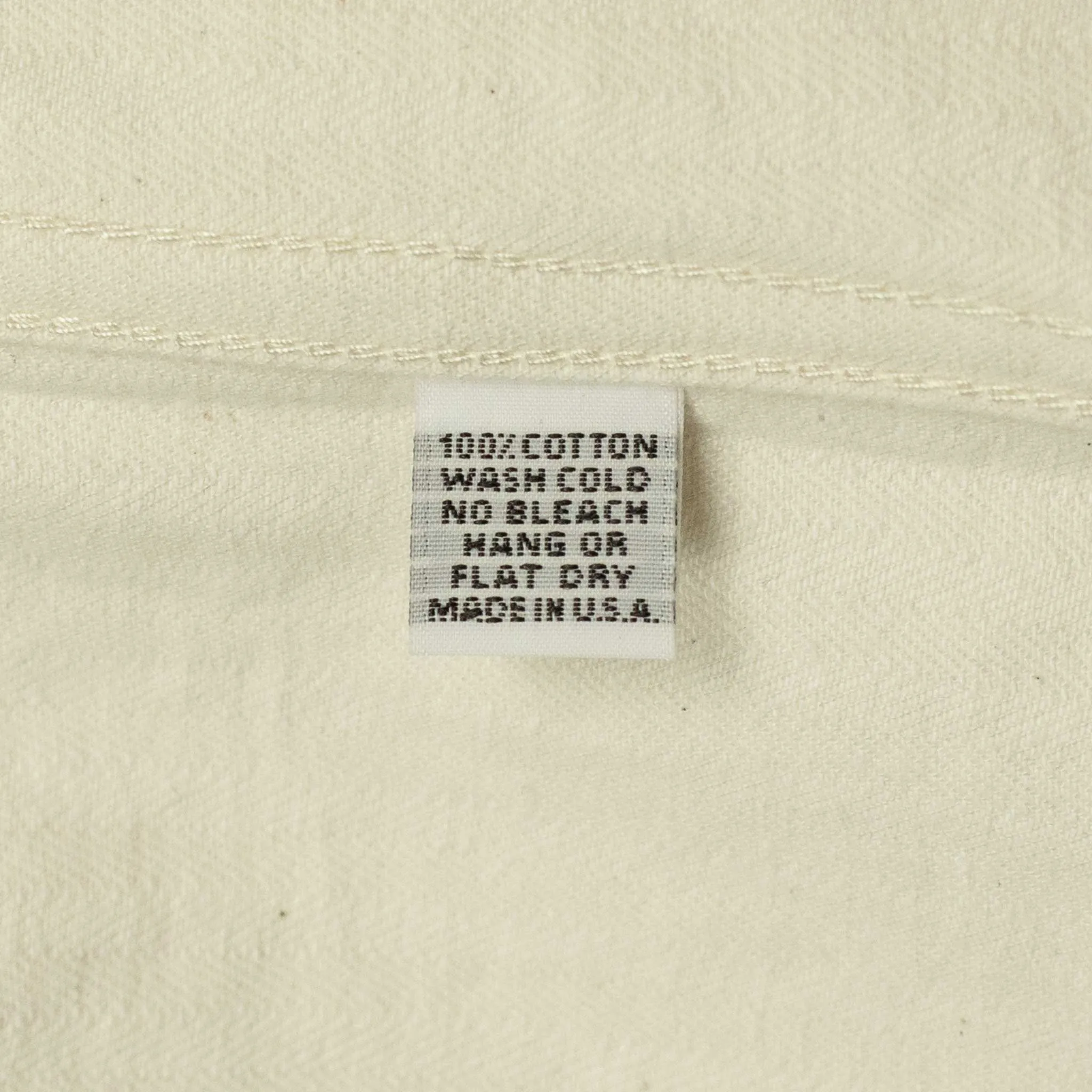 Officer jacket in washed natural herringbone cotton