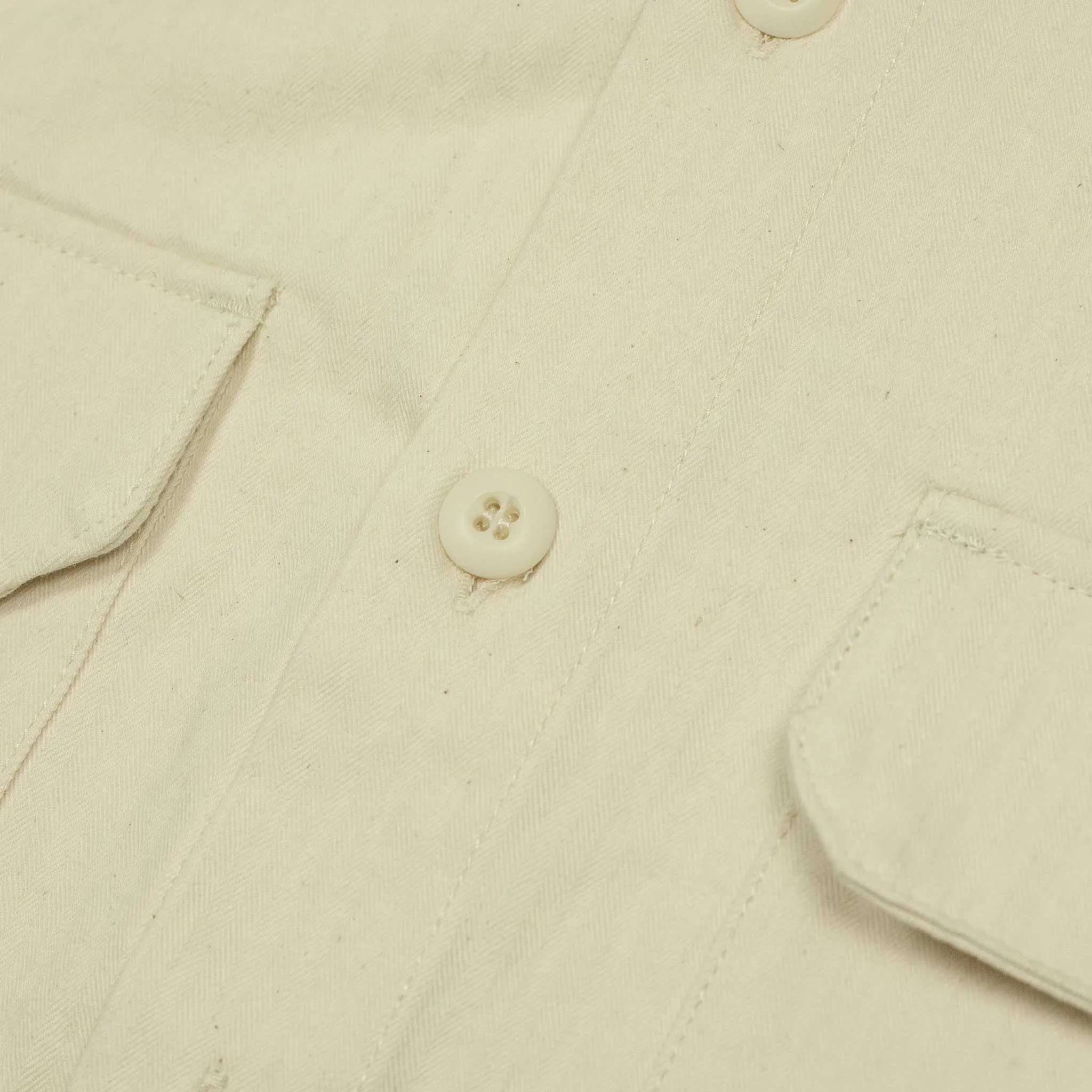 Officer jacket in washed natural herringbone cotton