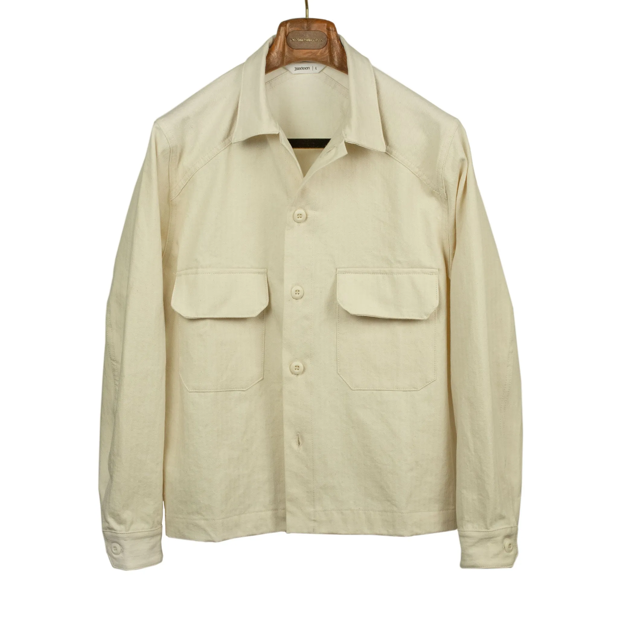 Officer jacket in washed natural herringbone cotton