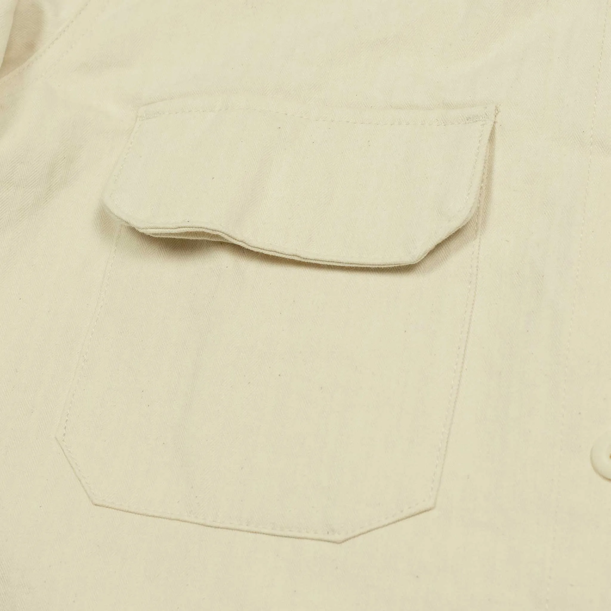 Officer jacket in washed natural herringbone cotton