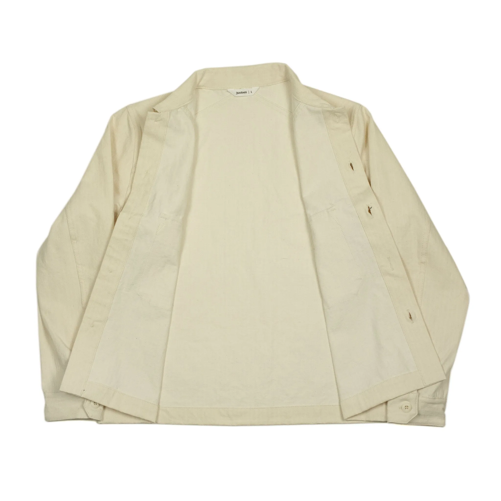 Officer jacket in washed natural herringbone cotton